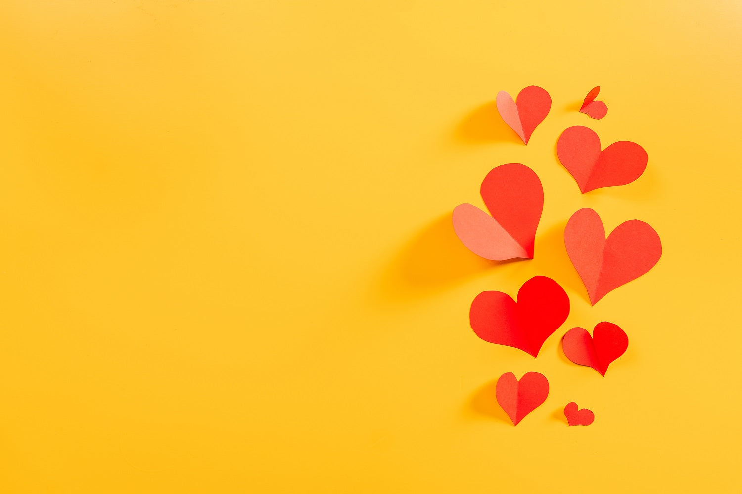 Red Hearts Against Yellow Background For Valentine's Day IBD-24377